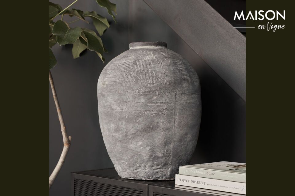 Bring rustic, modern style to your home with this concrete vase.