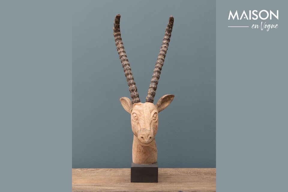 Discover the distinctive charm and timeless elegance of our mango wood gazelle figurine