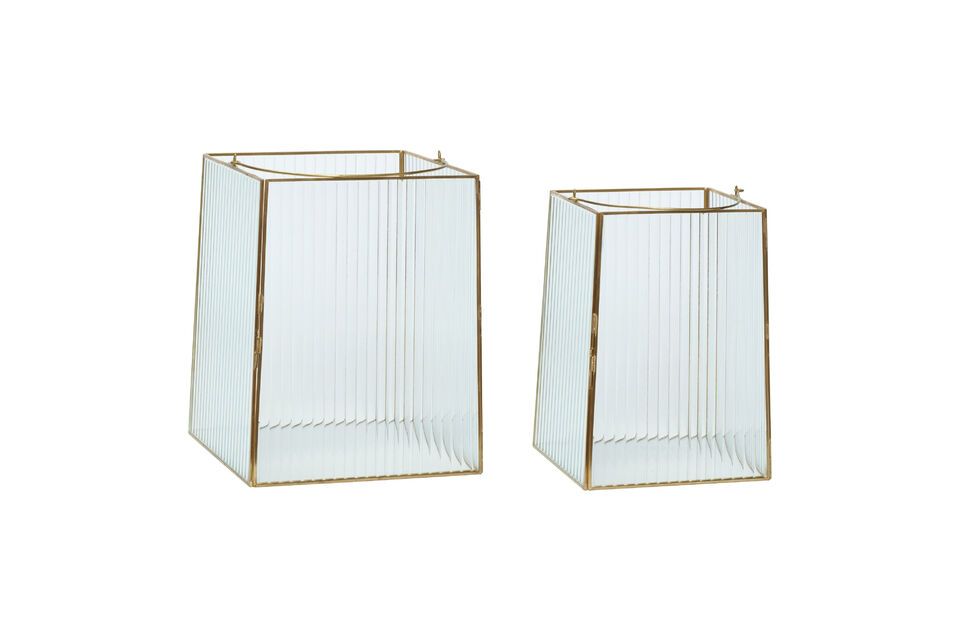 This set of two Ripple lanterns combines clear glass and brass finishes to provide elegant