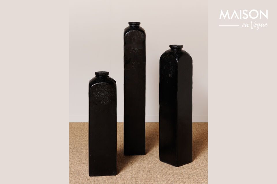 Elegance and functionality with our trio of black vases.