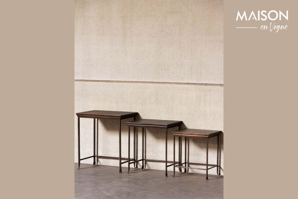 Discover functional elegance with our set of three copper-colored iron side tables