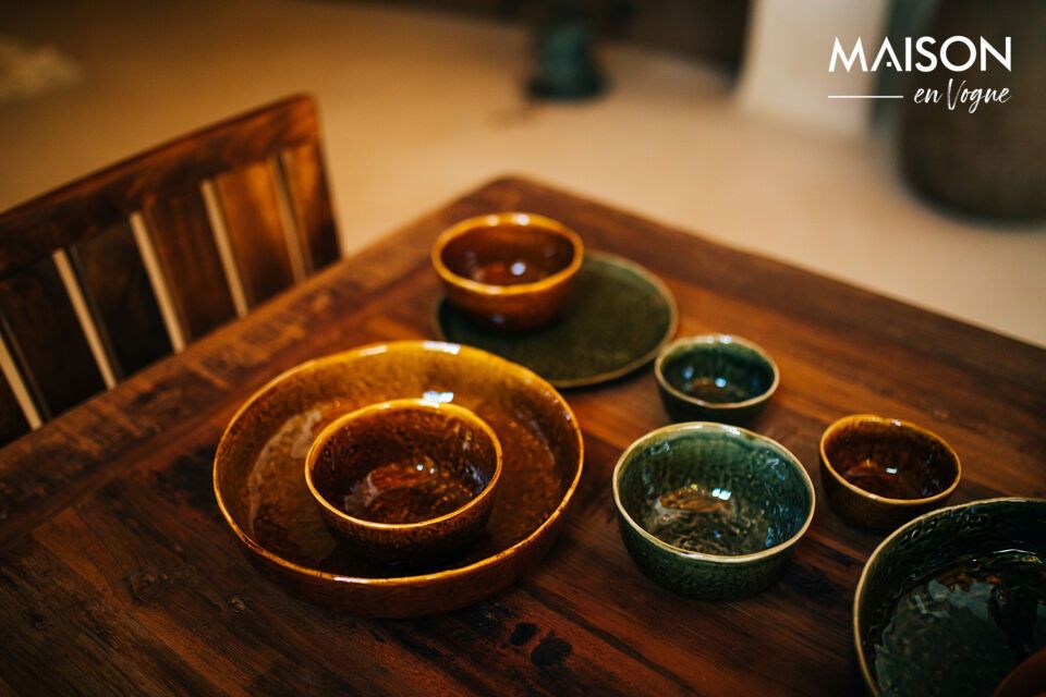 Discover the charm and functionality of the small brown stoneware dish Spiro, designed by Pomax