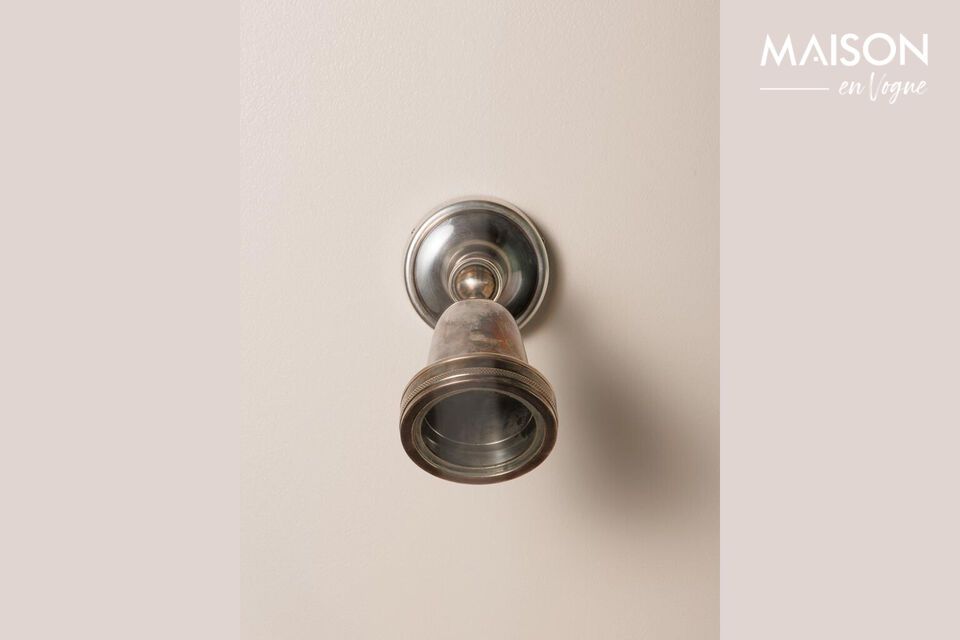 Discover timeless elegance with our copper-colored brass sconce