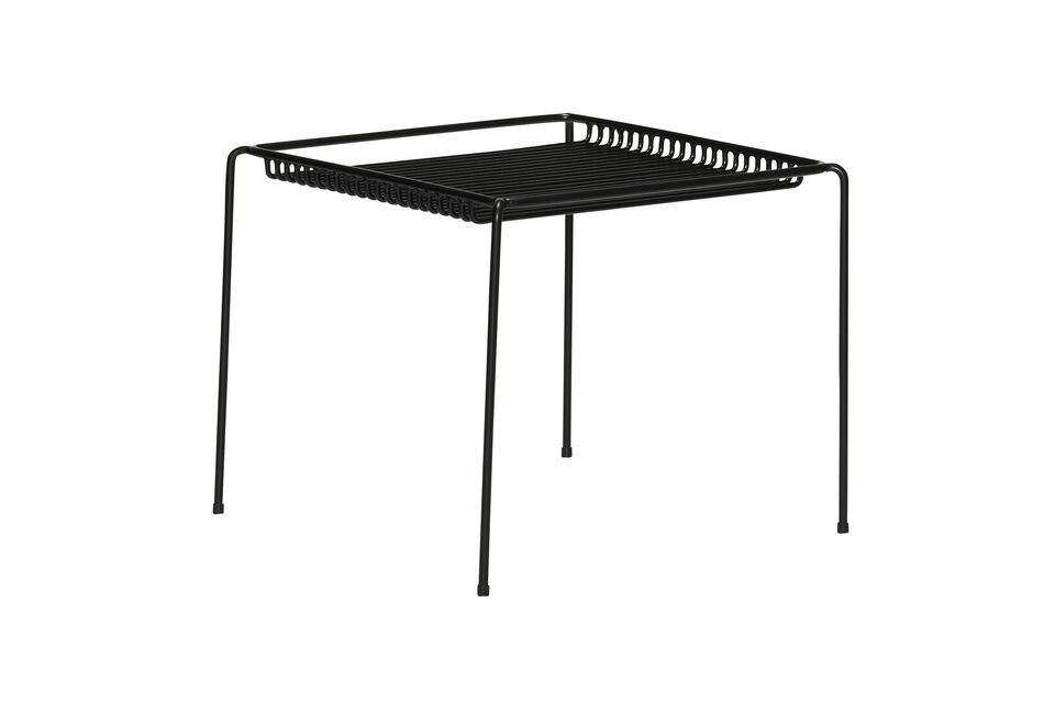 The String side table in black metal is an elegant and practical addition to any outdoor space