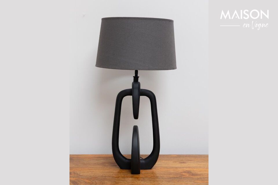 Discover functional elegance with our Disc black aluminum table lamp