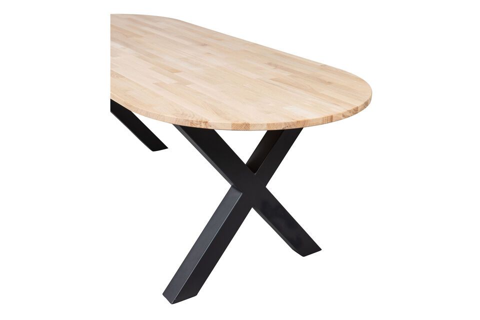 This untreated oak dining table offers a modern design with plenty of seating capacity