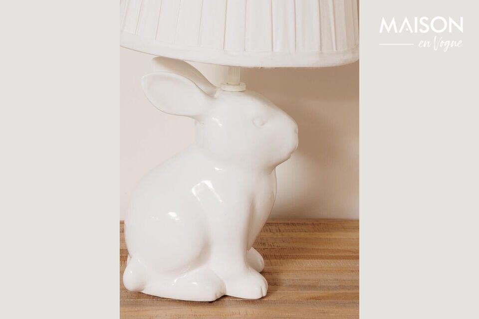 Discover the timeless elegance of our pure white stoneware table lamp