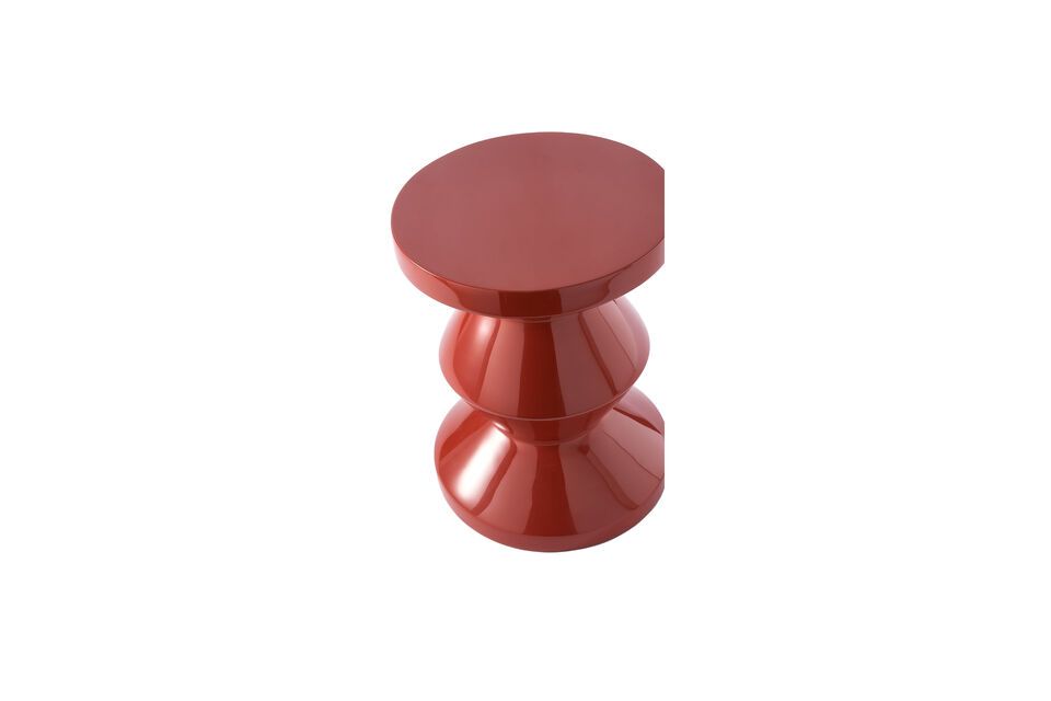 Discover the bold charm of the Zig zag Stool in coral-red fiberglass